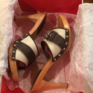 Super cute and Comfortable Coach Sandal.